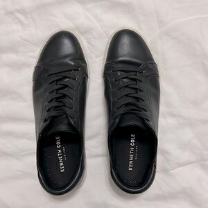 Black leather Kenneth Cole sneakers. Size 7. Slightly worn.